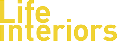 The yellow text "Life Interiors" is displayed on a white background with a blonde woman named Emma Blomfield in the image.