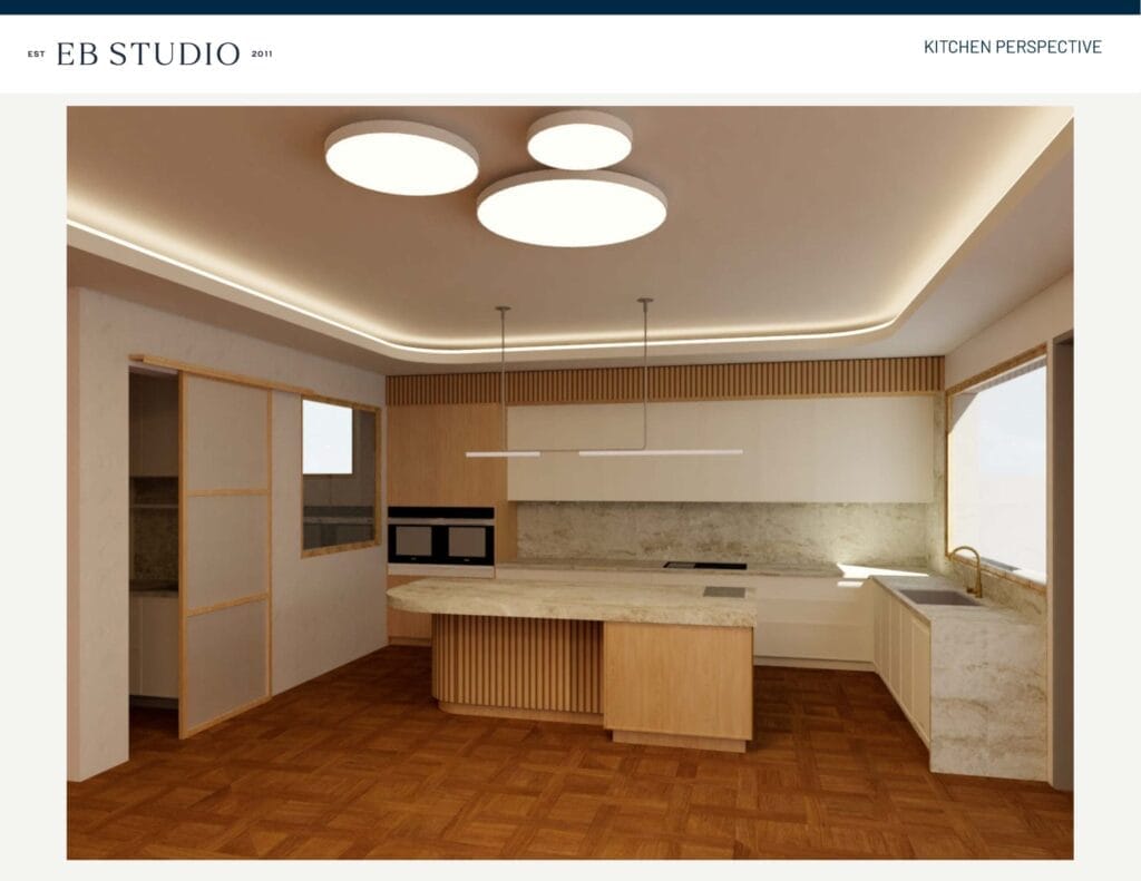 Emma Blomfield stands in a modern kitchen featuring wooden cabinetry, a marble island, two ceiling lights, a built-in oven, large windows, parquet flooring, and recessed ceiling lights.