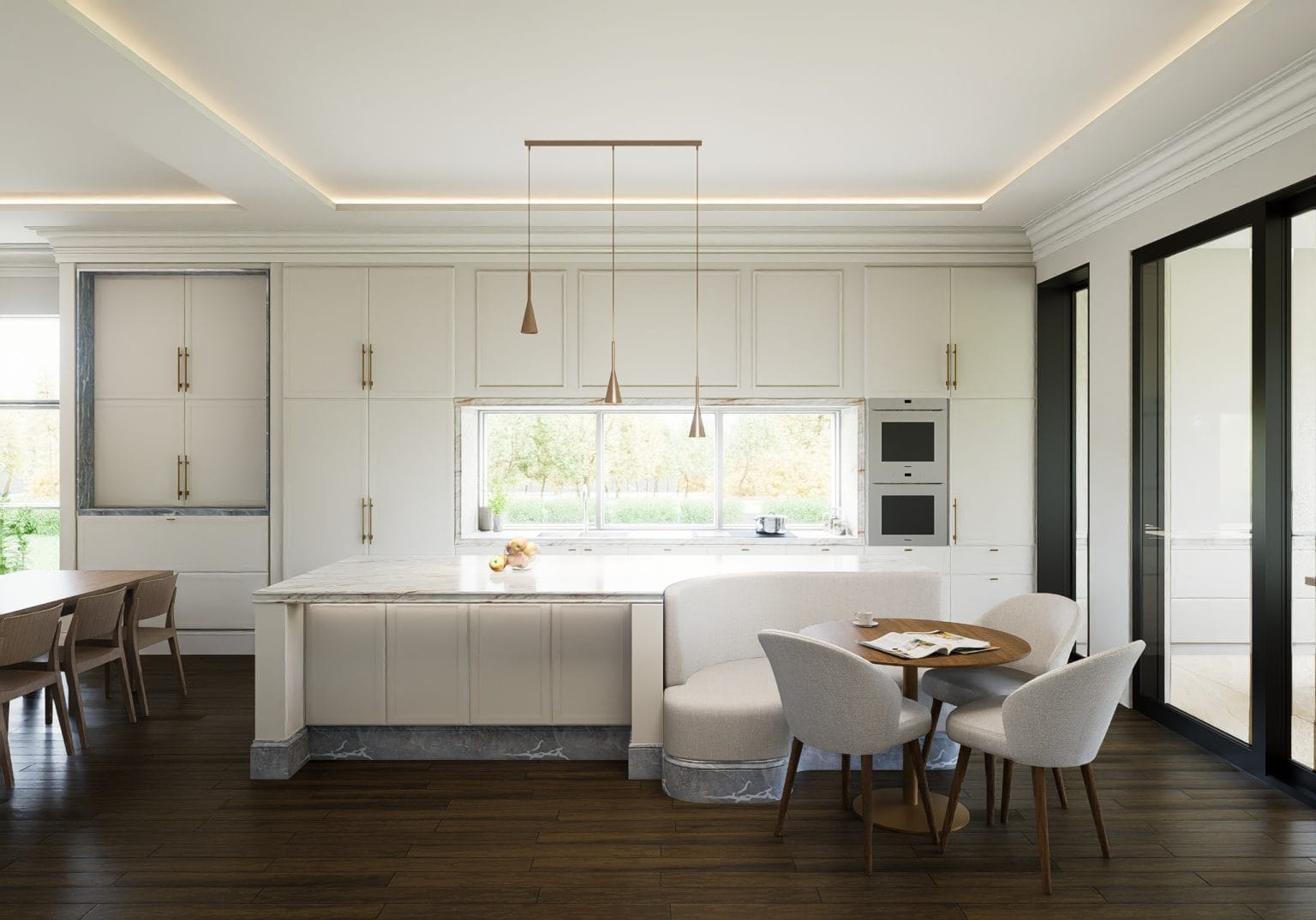 A modern kitchen features white cabinets, a marble island, built-in appliances, a window over the sink, and a round dining table for four on dark wood floors.
