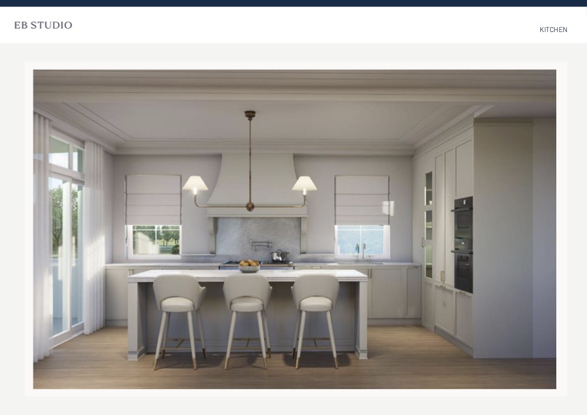 A modern kitchen features white cabinets, a central island with three stools, pendant lights overhead, built-in ovens, and large windows that fill the space with natural light.